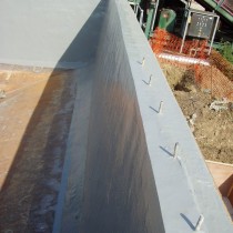 Odbudowany beton i zbiornik zabezpieczony przed przyszłymi uszkodzeniami z użyciem materiału Belzona 5811 (Immersion Grade)